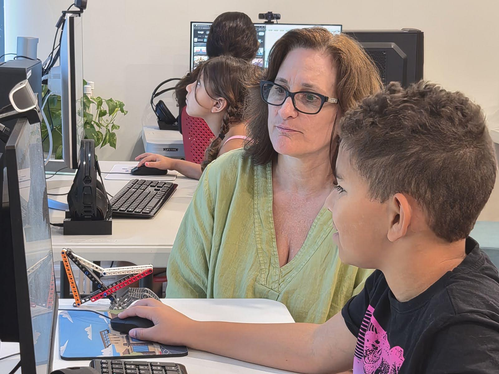 Teacher working with a student