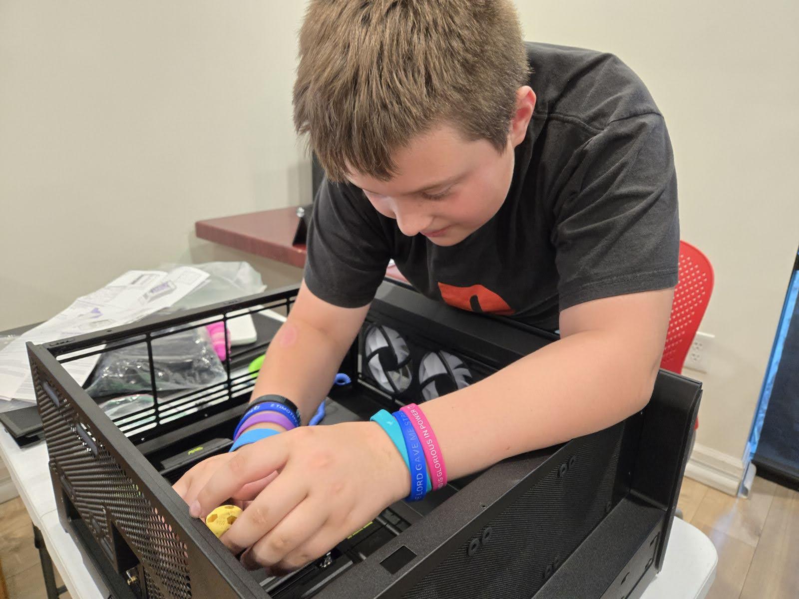 A student building at a computer